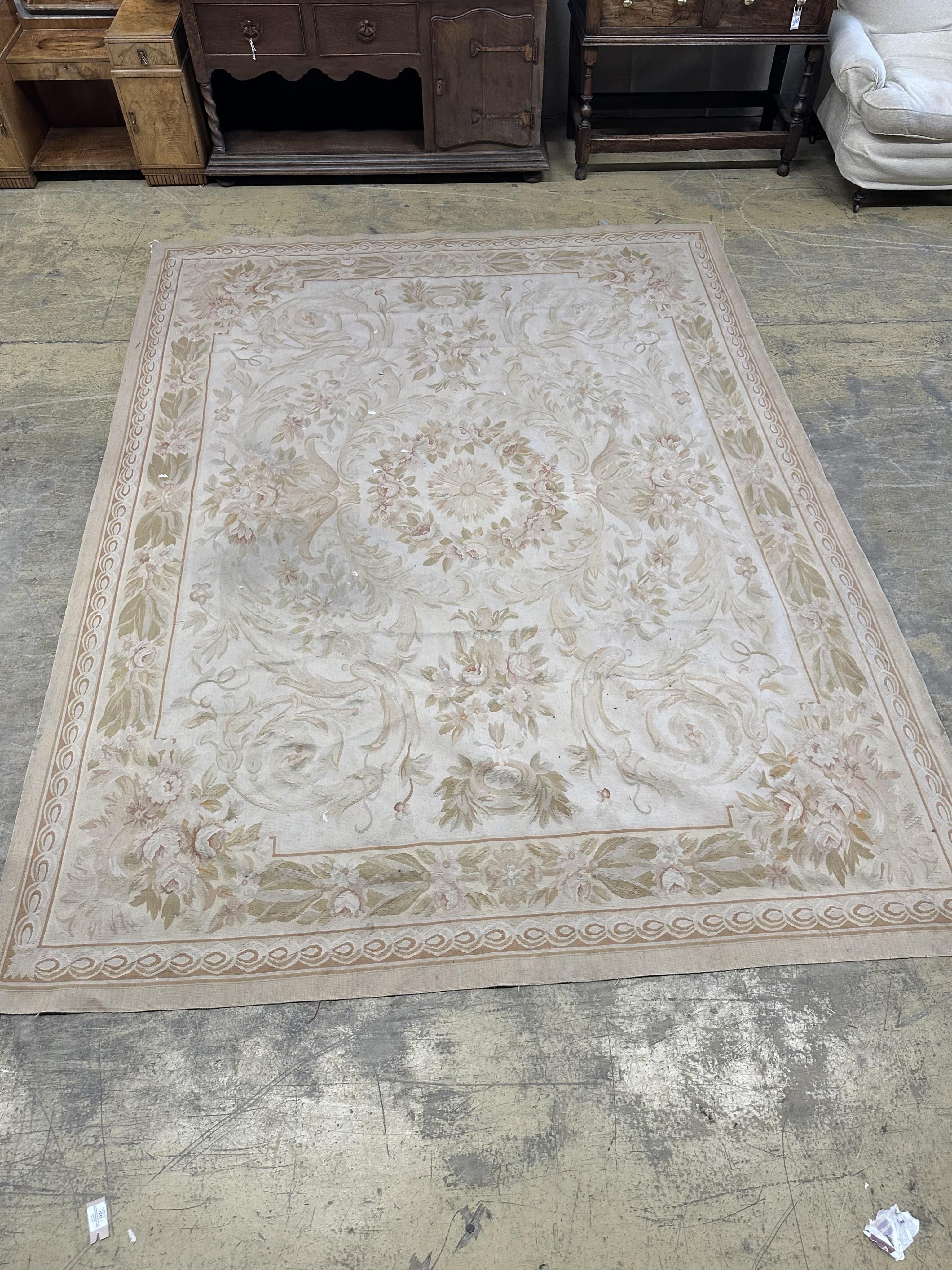 An Aubusson style carpet, 312 x 240cm. Condition - fair